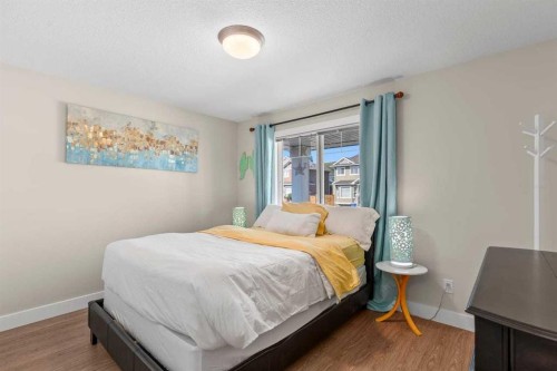 317 Mcleod Crescent, Diamond Valley, AB - Indoor Photo Showing Bedroom