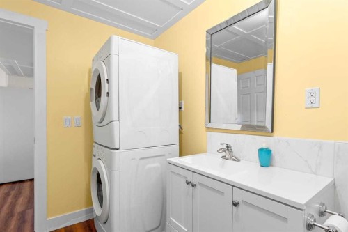 317 Mcleod Crescent, Diamond Valley, AB - Indoor Photo Showing Laundry Room