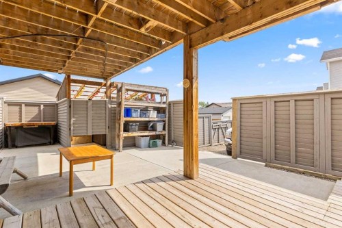 317 Mcleod Crescent, Diamond Valley, AB - Outdoor With Deck Patio Veranda With Exterior