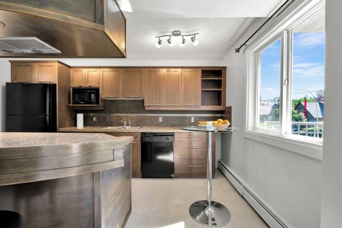 302-1730 7 Street, Calgary, AB - Indoor Photo Showing Kitchen