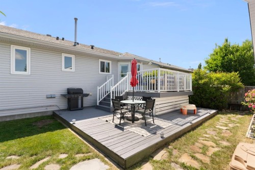 34 West Mcmanus Road, Cochrane, AB - Outdoor With Deck Patio Veranda With Exterior