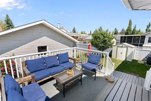 34 West Mcmanus Road, Cochrane, AB - Outdoor With Deck Patio Veranda With Exterior