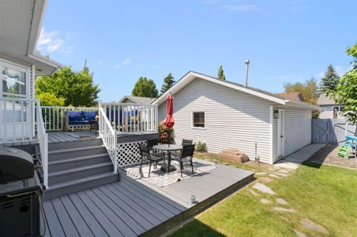 34 West Mcmanus Road, Cochrane, AB - Outdoor With Deck Patio Veranda With Exterior