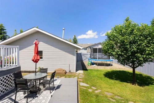 34 West Mcmanus Road, Cochrane, AB - Outdoor With Deck Patio Veranda With Exterior