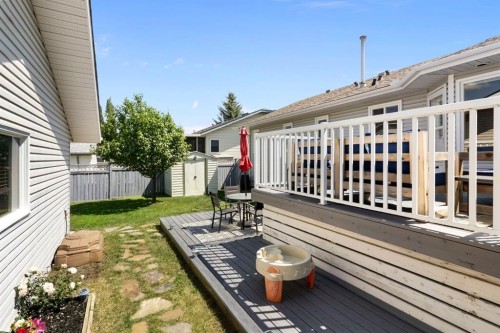 34 West Mcmanus Road, Cochrane, AB - Outdoor With Deck Patio Veranda With Exterior