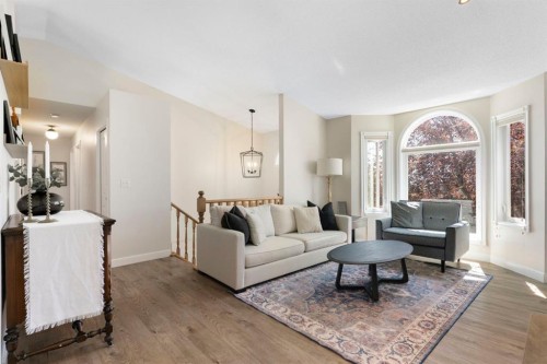 34 West Mcmanus Road, Cochrane, AB - Indoor Photo Showing Living Room