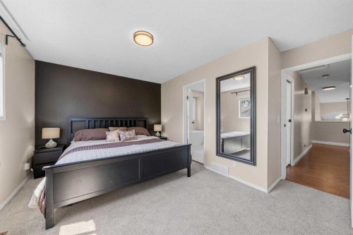 71 Riverglen Crescent Se, Calgary, AB - Indoor Photo Showing Bedroom