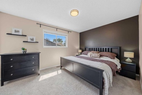 71 Riverglen Crescent Se, Calgary, AB - Indoor Photo Showing Bedroom