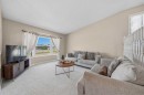 71 Riverglen Crescent Se, Calgary, AB  - Indoor Photo Showing Living Room 