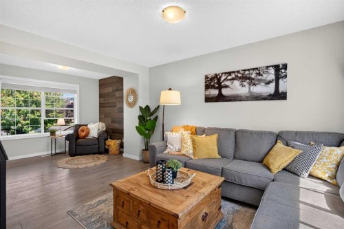 66 Canoe Close Sw, Airdrie, AB - Indoor Photo Showing Living Room