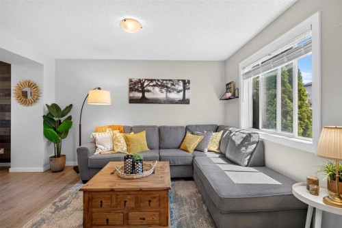 66 Canoe Close Sw, Airdrie, AB - Indoor Photo Showing Living Room