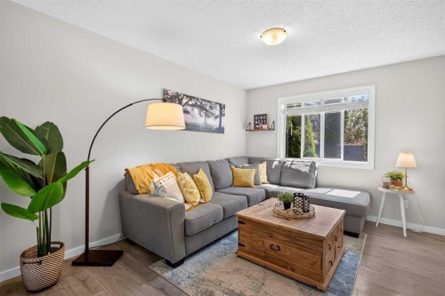 66 Canoe Close Sw, Airdrie, AB - Indoor Photo Showing Living Room