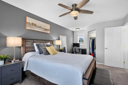 66 Canoe Close Sw, Airdrie, AB - Indoor Photo Showing Bedroom