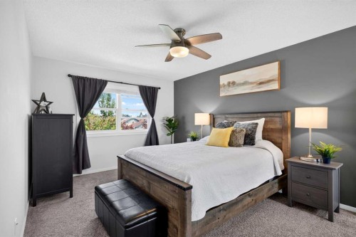 66 Canoe Close Sw, Airdrie, AB - Indoor Photo Showing Bedroom