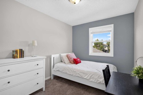 66 Canoe Close Sw, Airdrie, AB - Indoor Photo Showing Bedroom