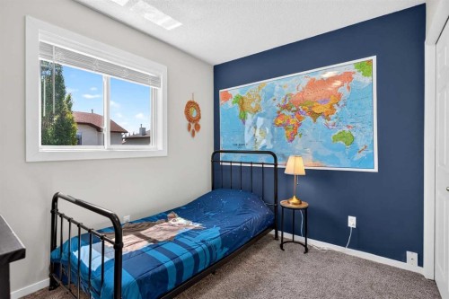66 Canoe Close Sw, Airdrie, AB - Indoor Photo Showing Bedroom