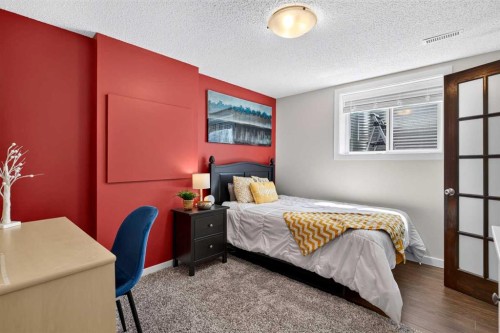 66 Canoe Close Sw, Airdrie, AB - Indoor Photo Showing Bedroom
