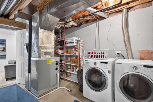 66 Canoe Close Sw, Airdrie, AB - Indoor Photo Showing Laundry Room