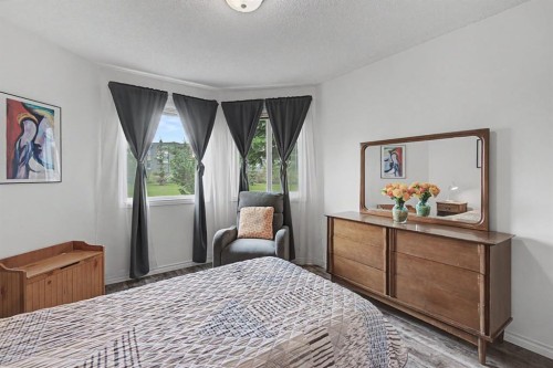 1114-1818 Simcoe Boulevard Sw, Calgary, AB - Indoor Photo Showing Bedroom
