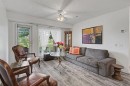 1114-1818 Simcoe Boulevard Sw, Calgary, AB  - Indoor Photo Showing Living Room 