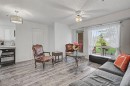 1114-1818 Simcoe Boulevard Sw, Calgary, AB  - Indoor Photo Showing Living Room 