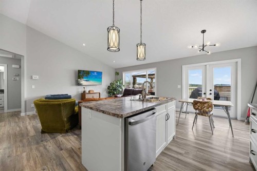 6 Valarosa Cove, Didsbury, AB - Indoor Photo Showing Kitchen With Double Sink With Upgraded Kitchen