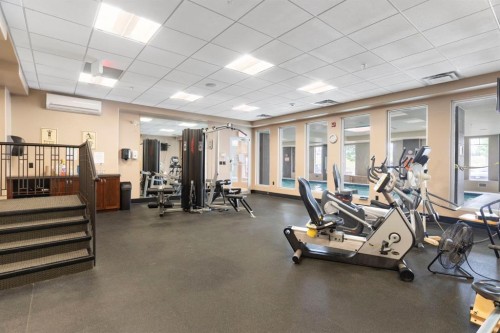 2444-2330 Fish Creek Boulevard Sw, Calgary, AB - Indoor Photo Showing Gym Room