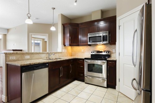 2444-2330 Fish Creek Boulevard Sw, Calgary, AB - Indoor Photo Showing Kitchen