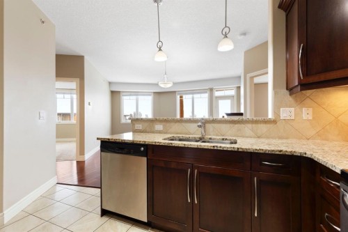 2444-2330 Fish Creek Boulevard Sw, Calgary, AB - Indoor Photo Showing Kitchen With Double Sink