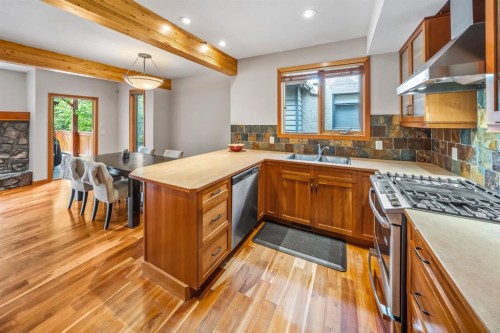 4-813 5Th Street, Canmore, AB - Indoor Photo Showing Kitchen With Double Sink