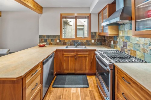 4-813 5Th Street, Canmore, AB - Indoor Photo Showing Kitchen With Double Sink