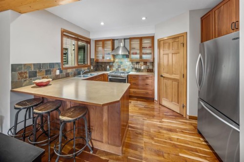 4-813 5Th Street, Canmore, AB - Indoor Photo Showing Kitchen With Double Sink