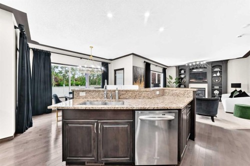 188 Hawkmere Way, Chestermere, AB - Indoor Photo Showing Kitchen With Double Sink
