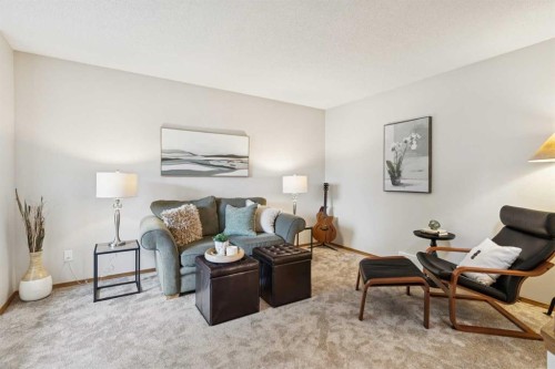 410 Millrise Drive Sw, Calgary, AB - Indoor Photo Showing Living Room