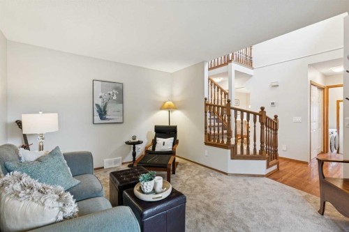 410 Millrise Drive Sw, Calgary, AB - Indoor Photo Showing Living Room