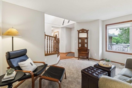 410 Millrise Drive Sw, Calgary, AB - Indoor Photo Showing Living Room