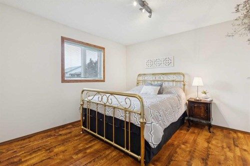 410 Millrise Drive Sw, Calgary, AB - Indoor Photo Showing Bedroom