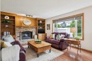 410 Millrise Drive Sw, Calgary, AB  - Indoor Photo Showing Living Room With Fireplace 