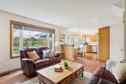 410 Millrise Drive Sw, Calgary, AB - Indoor Photo Showing Living Room