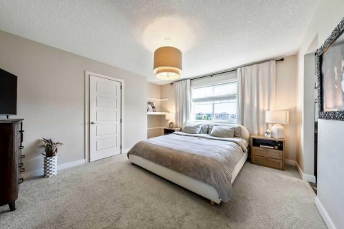148 Rainbow Falls Glen, Chestermere, AB - Indoor Photo Showing Bedroom