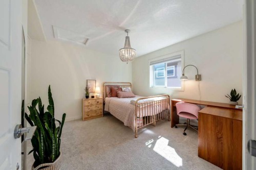148 Rainbow Falls Glen, Chestermere, AB - Indoor Photo Showing Bedroom