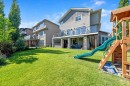 148 Rainbow Falls Glen, Chestermere, AB  - Outdoor With Deck Patio Veranda 