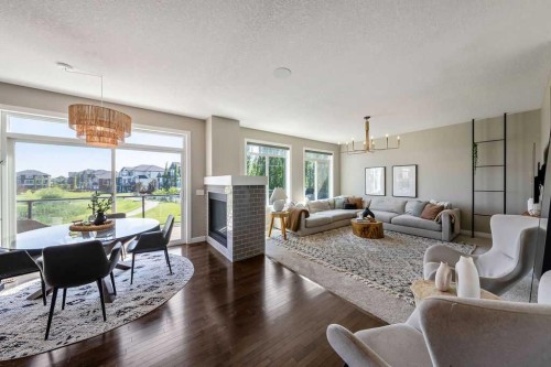 148 Rainbow Falls Glen, Chestermere, AB - Indoor Photo Showing Living Room With Fireplace