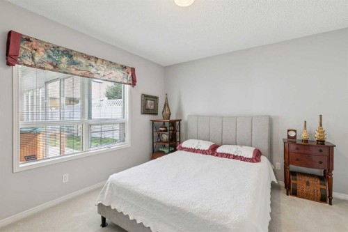 38 Edgevalley Manor Nw, Calgary, AB - Indoor Photo Showing Bedroom