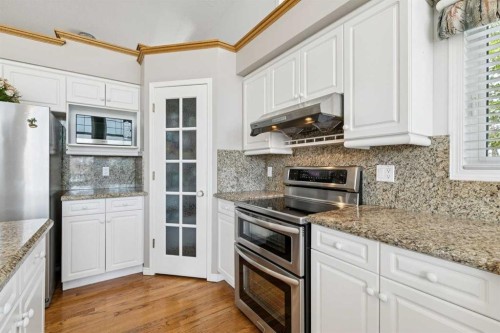 38 Edgevalley Manor Nw, Calgary, AB - Indoor Photo Showing Kitchen With Stainless Steel Kitchen With Upgraded Kitchen