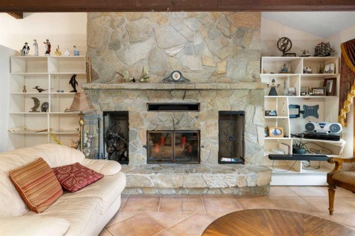 Range Rd 231, Rural Vulcan County, AB - Indoor Photo Showing Living Room With Fireplace