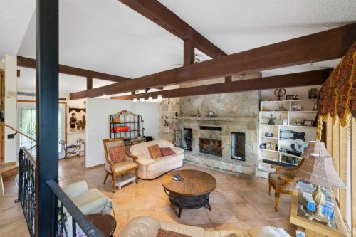 Range Rd 231, Rural Vulcan County, AB - Indoor Photo Showing Living Room With Fireplace