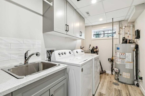 117 Chinook Drive Sw, Calgary, AB - Indoor Photo Showing Laundry Room