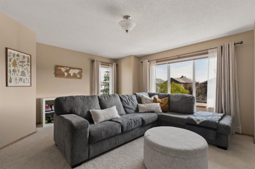36 Cranfield Manor Se, Calgary, AB - Indoor Photo Showing Living Room