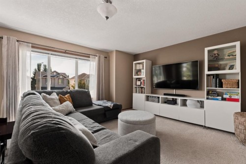 36 Cranfield Manor Se, Calgary, AB - Indoor Photo Showing Living Room